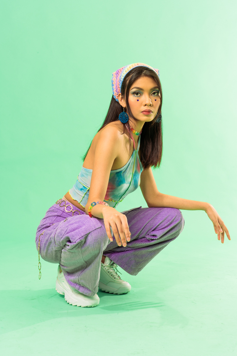 Portrait of a Young Woman in 90s Fashion
